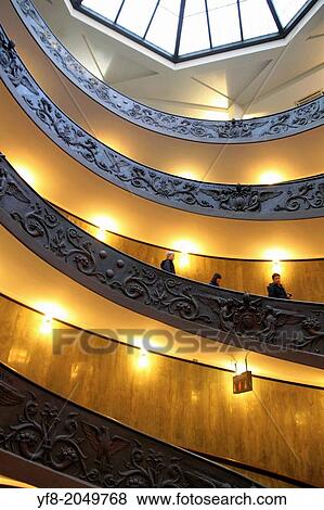 VATICAN, ROME, ITALY-JANUARY 21: Tourists descending by the spiral staircase of the Vatican Museums, on January, 21 2013 in Rome. View Large Photo Image Stock Photo - VATICAN, ROME, ITALY-JANUARY 21: Tourists descending by the spiral staircase of the Vatican Museums, on January, 21 2013 in Rome.. Fotosearch