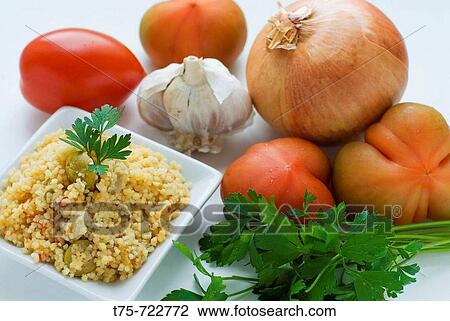 Vegetable couscous with olives View Large Photo Image Stock Image - Vegetable couscous with olives. Fotosearch