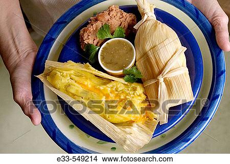 Vegetarian plate - cheese tamale and refried beans. View Large Photo Image Picture - Vegetarian plate - cheese tamale and refried beans.. Fotosearch