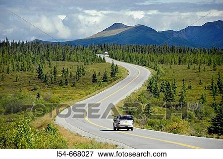 Stock Photo - Vehicles in Denali National Park along Park Road between entrance and Savage River Alaska AK U S United States Mt McKinley. Fotosearch