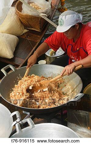 vendor making mee krob noodles at a floating market in Bangkok Thailand View Large Photo Image Stock Photography - vendor making mee krob noodles at a floating market in Bangkok Thailand. Fotosearch