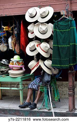 Vendor of straw hat in Santiago de Atitlan, Guatemala, Central America. View Large Photo Image Stock Photograph - Vendor of straw hat in Santiago de Atitlan, Guatemala, Central America.. Fotosearch
