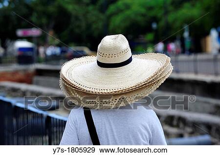 vendor of Straw hats in Havana, Cuba View Large Photo Image Stock Photo - vendor of Straw hats in Havana, Cuba. Fotosearch