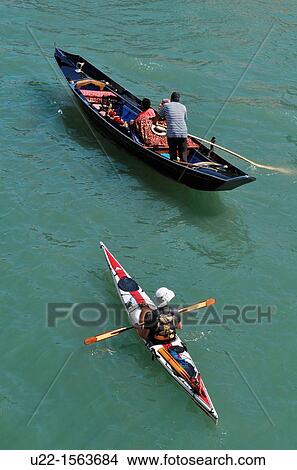 Venezia (Italy): gondola and canoe along the Canal Grande View Large Photo Image Picture - Venezia (Italy): gondola and canoe along the Canal Grande. Fotosearch