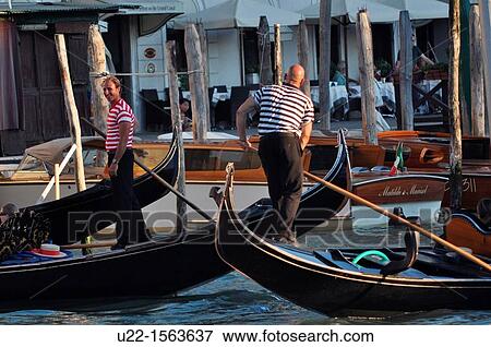 Venezia (Italy): gondole and gondolieri View Large Photo Image Stock Photo - Venezia (Italy): gondole and gondolieri. Fotosearch