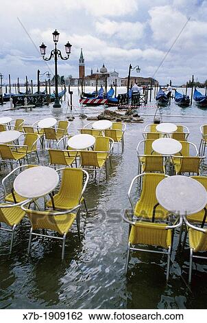 Stock Image - Venice Italy Acqua alta high water floods St Mark's Square. Fotosearch