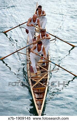 Stock Photography - Venice Italy Rowing team racing during the Regata Storica Historical Regatta The Regata Storica takes place annually on the first Sunday of September. Fotosearch