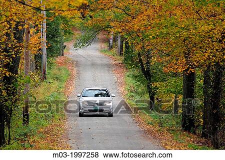Vermont New England USA fall foliage mountain road with colorful leaves VT. View Large Photo Image Stock Photo - Vermont New England USA fall foliage mountain road with colorful leaves VT.. Fotosearch