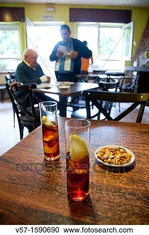 Vermouth for two in a typical Spanish bar. Porrua, Asturias province, Spain. View Large Photo Image Stock Image - Vermouth for two in a typical Spanish bar. Porrua, Asturias province, Spain.. Fotosearch
