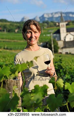 Veronique Dupasquier, wine grower, tasting wine in the vineyard at Jongieux, Savoie department, Rhone-Alpes region, France, Europe. View Large Photo Image Stock Photography - Veronique Dupasquier, wine grower, tasting wine in the vineyard at Jongieux, Savoie department, Rhone-Alpes region, France, Europe.. Fotosearch