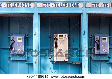 Vertical image of blue, public telephone boxes with three telephones, nobody around, Addis Ababa, Ethiopia, East Africa. View Large Photo Image Stock Photography - Vertical image of blue, public telephone boxes with three telephones, nobody around, Addis Ababa, Ethiopia, East Africa.. Fotosearch