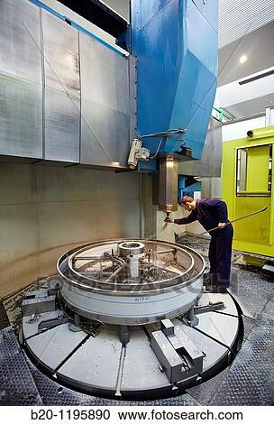 Vertical lathe for turning very large diameters and heavy workpieces, manufacture of stainless steel containers, Gipuzkoa, Euskadi, Spain View Large Photo Image Stock Image - Vertical lathe for turning very large diameters and heavy workpieces, manufacture of stainless steel containers, Gipuzkoa, Euskadi, Spain. Fotosearch