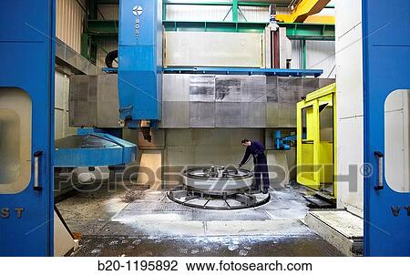 Vertical lathe for turning very large diameters and heavy workpieces, manufacture of stainless steel containers, Gipuzkoa, Euskadi, Spain View Large Photo Image Stock Image - Vertical lathe for turning very large diameters and heavy workpieces, manufacture of stainless steel containers, Gipuzkoa, Euskadi, Spain. Fotosearch