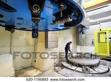 Vertical lathe for turning very large diameters and heavy workpieces, manufacture of stainless steel containers, Gipuzkoa, Euskadi, Spain View Large Photo Image Stock Image - Vertical lathe for turning very large diameters and heavy workpieces, manufacture of stainless steel containers, Gipuzkoa, Euskadi, Spain. Fotosearch