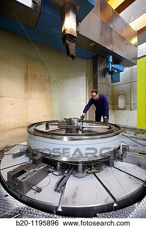Stock Photograph - Vertical lathe for turning very large diameters and heavy workpieces, manufacture of stainless steel containers, Gipuzkoa, Euskadi, Spain. Fotosearch