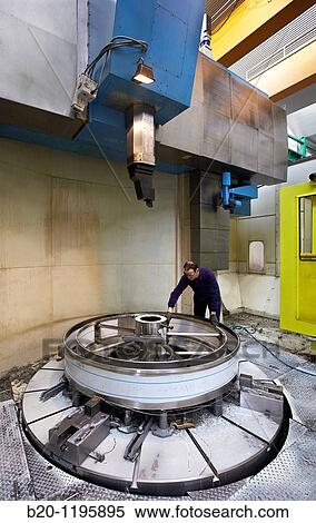 Vertical lathe for turning very large diameters and heavy workpieces, manufacture of stainless steel containers, Gipuzkoa, Euskadi, Spain View Large Photo Image Stock Photography - Vertical lathe for turning very large diameters and heavy workpieces, manufacture of stainless steel containers, Gipuzkoa, Euskadi, Spain. Fotosearch
