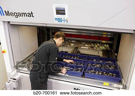 Vertical office carousel, dynamic storage system, spindle manufacturing. Mendaro, Gipuzkoa, Euskadi, Spain View Large Photo Image Stock Image - Vertical office carousel, dynamic storage system, spindle manufacturing. Mendaro, Gipuzkoa, Euskadi, Spain. Fotosearch