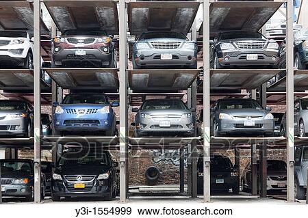 Vertical parking spaces in Manhattan, New York City, New York, USA View Large Photo Image Stock Photo - Vertical parking spaces in Manhattan, New York City, New York, USA. Fotosearch