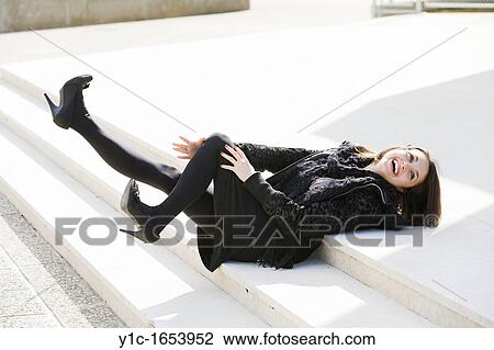 Stock Image - Very excited young woman. Fotosearch