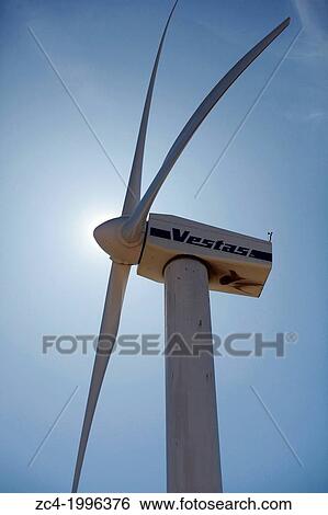 Vestas wind turbine, close against blue sky. View Large Photo Image Stock Photograph - Vestas wind turbine, close against blue sky.. Fotosearch