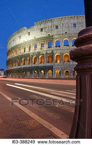 Via dei Fori Imperiali. Night view of the Colosseum in Rome. Italy View Large Photo Image Stock Photo - Via dei Fori Imperiali. Night view of the Colosseum in Rome. Italy. Fotosearch
