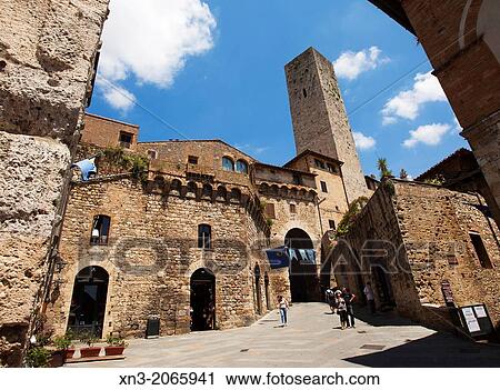 Stock Image - Via San Matteo, San Matteo Street, San Gimignano, UNESCO World Heritage, Siena province, Tuscany, Italy, Europe.. Fotosearch