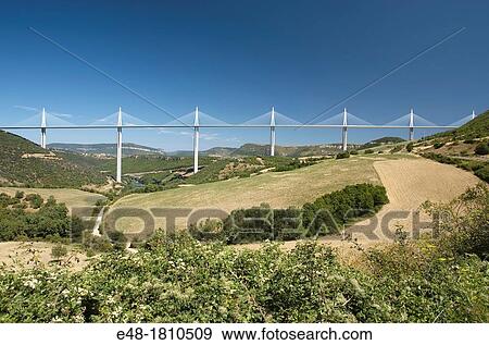 VIADUCT DE MILLAU AUTOROUTE 75 LA MERIDIEE MASSIF CENTRAL AVEYRON FRANCE View Large Photo Image Stock Photo - VIADUCT DE MILLAU AUTOROUTE 75 LA MERIDIEE MASSIF CENTRAL AVEYRON FRANCE. Fotosearch