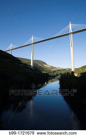 VIADUCT DE MILLAU OVER RIVER TARN MASSIF CENTRAL AVEYRON FRANCE View Large Photo Image Stock Photo - VIADUCT DE MILLAU OVER RIVER TARN MASSIF CENTRAL AVEYRON FRANCE. Fotosearch
