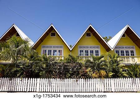 Vibrant yellow hotel on Isla Colon, Bocas del Toro, Panama View Large Photo Image Picture - Vibrant yellow hotel on Isla Colon, Bocas del Toro, Panama. Fotosearch