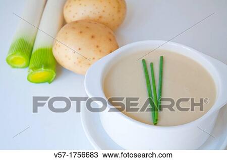 Stock Image - Vichyssoise with ingredients. Still life.. Fotosearch