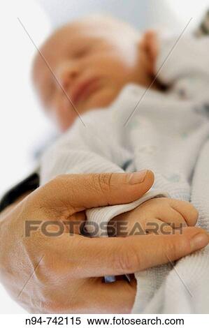 Victor reci? n nacido en brazos de su mamB. View Large Photo Image Stock Photography - Victor reci? n nacido en brazos de su mamB.. Fotosearch