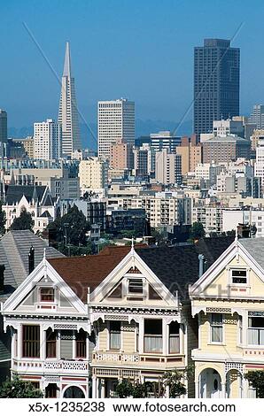 Victorian houses on Steiner street facing Alamo Square and city skyline, San Francisco, California, USA View Large Photo Image Stock Photo - Victorian houses on Steiner street facing Alamo Square and city skyline, San Francisco, California, USA. Fotosearch