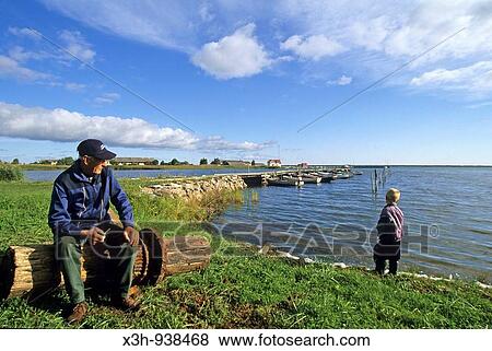 vieil homme et jeune pecheur, Orissaare sur l? ile de Saaremaa, Estonie, pays balte, europe du nord View Large Photo Image Stock Photo - vieil homme et jeune pecheur, Orissaare sur l? ile de Saaremaa, Estonie, pays balte, europe du nord. Fotosearch