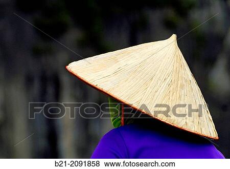 Stock Photo - Vietnam. Boat lady at the Ha Long Bay.. Fotosearch