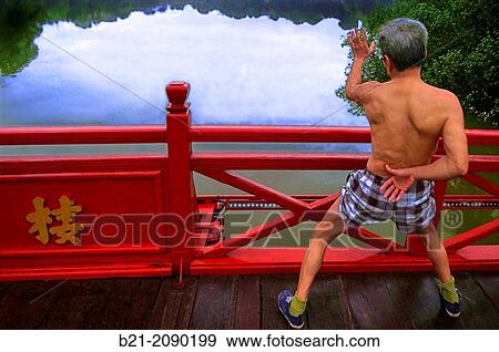 Vietnam. Hanoi. Gym, early morning around Hoan Kiem Lake. View Large Photo Image Stock Photo - Vietnam. Hanoi. Gym, early morning around Hoan Kiem Lake.. Fotosearch
