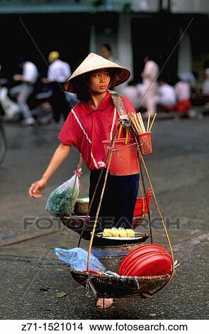 Picture - Vietnam Hanoi street vendor. Fotosearch