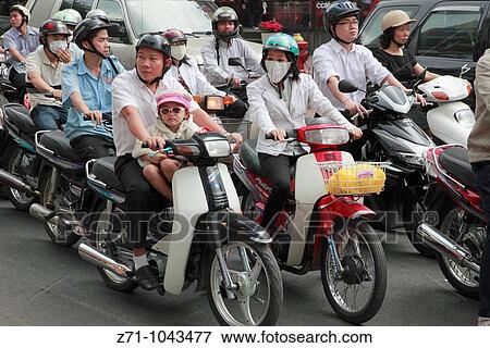Vietnam, Ho Chi Minh City, Saigon, people on motorcycles View Large Photo Image Stock Photo - Vietnam, Ho Chi Minh City, Saigon, people on motorcycles. Fotosearch