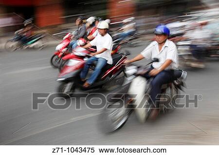 Vietnam, Ho Chi Minh City, Saigon, motorcycle traffic, people View Large Photo Image Stock Photography - Vietnam, Ho Chi Minh City, Saigon, motorcycle traffic, people. Fotosearch