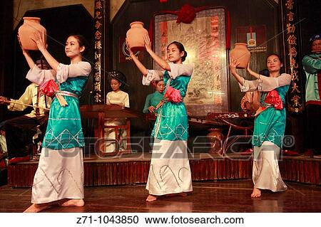 Stock Image - Vietnam, Hoi An, traditional dancers. Fotosearch