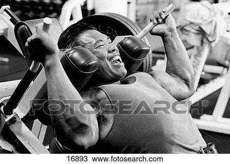 Vietnamese bodybuilder pressing heavy weight View Large Photo Image Stock Image - Vietnamese bodybuilder pressing heavy weight. Fotosearch