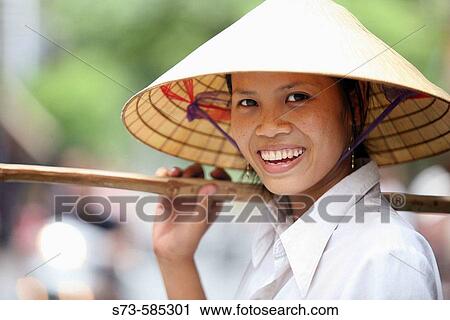 Vietnamese fruit seller. Hanoi, Vietnam View Large Photo Image Stock Image - Vietnamese fruit seller. Hanoi, Vietnam. Fotosearch