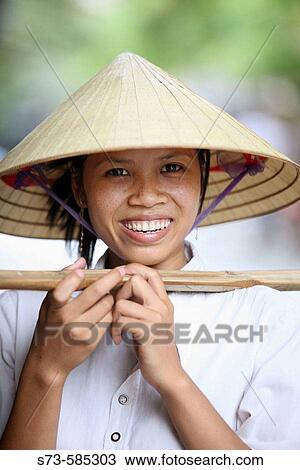 Vietnamese fruit seller. Hanoi, Vietnam View Large Photo Image Stock Image - Vietnamese fruit seller. Hanoi, Vietnam. Fotosearch