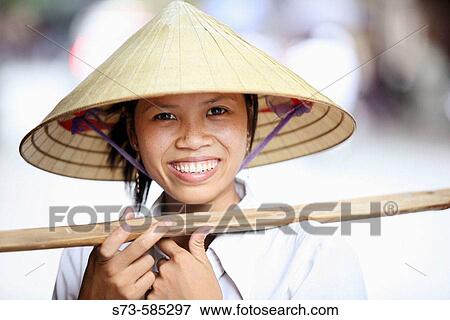 Vietnamese fruit seller. Hanoi, Vietnam View Large Photo Image Stock Photo - Vietnamese fruit seller. Hanoi, Vietnam. Fotosearch