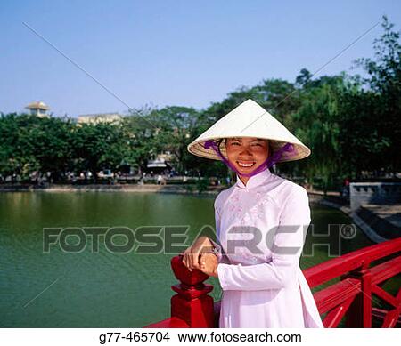 Vietnamese woman in traditional dress, Hanoi. Vietnam View Large Photo Image Picture - Vietnamese woman in traditional dress, Hanoi. Vietnam. Fotosearch