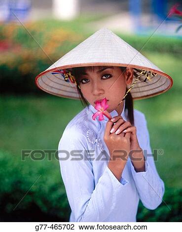 Vietnamese woman in traditional dress, Ho Chi Minh City. Vietnam View Large Photo Image Stock Image - Vietnamese woman in traditional dress, Ho Chi Minh City. Vietnam. Fotosearch