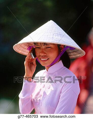 Vietnamese woman in traditional dress, Hanoi. Vietnam View Large Photo Image Stock Image - Vietnamese woman in traditional dress, Hanoi. Vietnam. Fotosearch