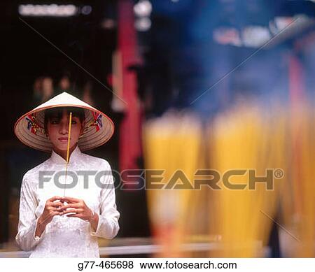Vietnamese woman in traditional dress, Ho Chi Minh City. Vietnam View Large Photo Image Stock Photo - Vietnamese woman in traditional dress, Ho Chi Minh City. Vietnam. Fotosearch
