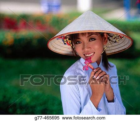 Vietnamese woman in traditional dress, Ho Chi Minh City. Vietnam View Large Photo Image Stock Photography - Vietnamese woman in traditional dress, Ho Chi Minh City. Vietnam. Fotosearch