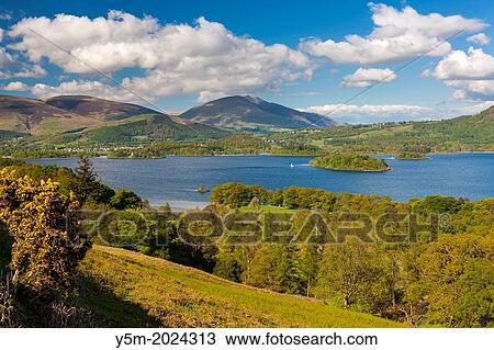 Stock Image - View across Derwent Water towards Keswick, Lake District National Park, Cumbria, England, UK, Europe.. Fotosearch