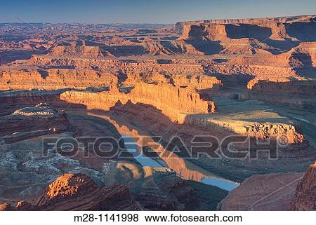 View down to the Colorado River at sunrise from overlook at Dead Horse Point State Park Utah View Large Photo Image Stock Photo - View down to the Colorado River at sunrise from overlook at Dead Horse Point State Park Utah. Fotosearch